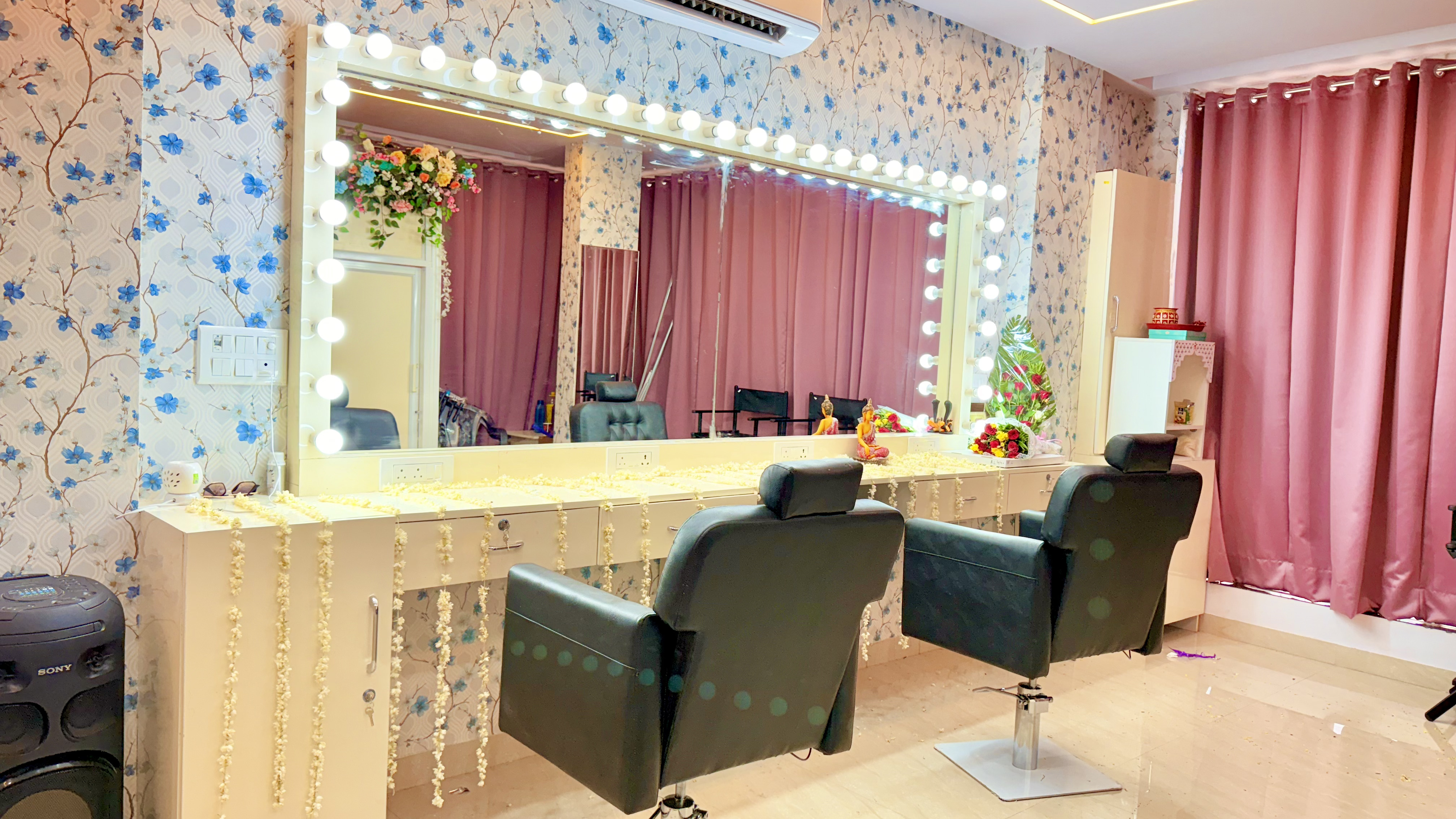 Professional makeup studio interior with vanity mirror